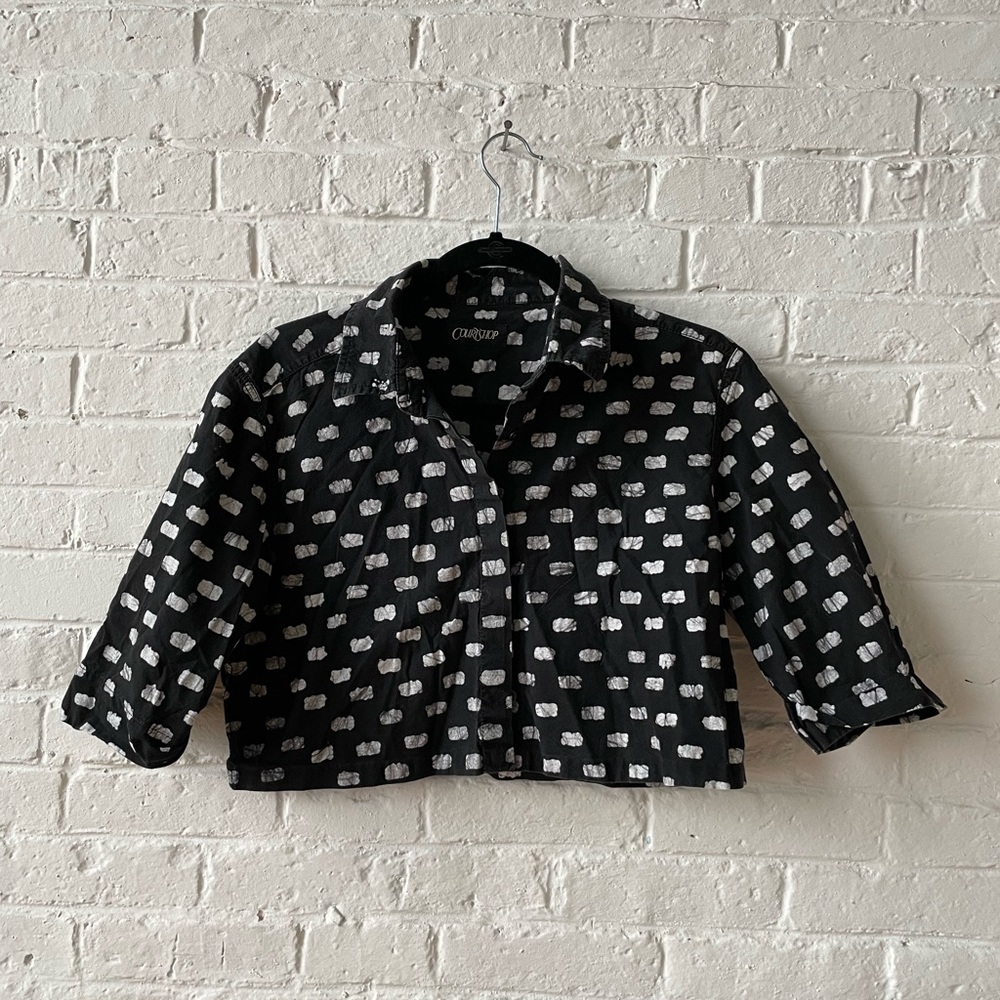 Black button up top with clouds